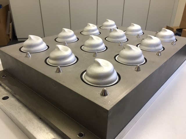 Complex design to cover an ice cream top. Tooling made by Queensbury Products Ltd, Bridgwater UK.